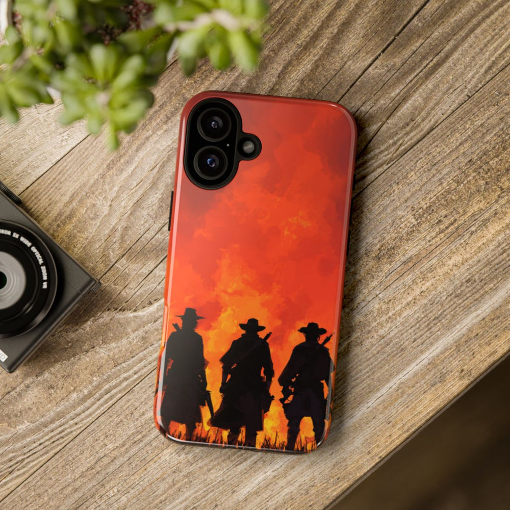 Silhouetten van Drie Cowboys Tegen Vurige Zonsondergang
