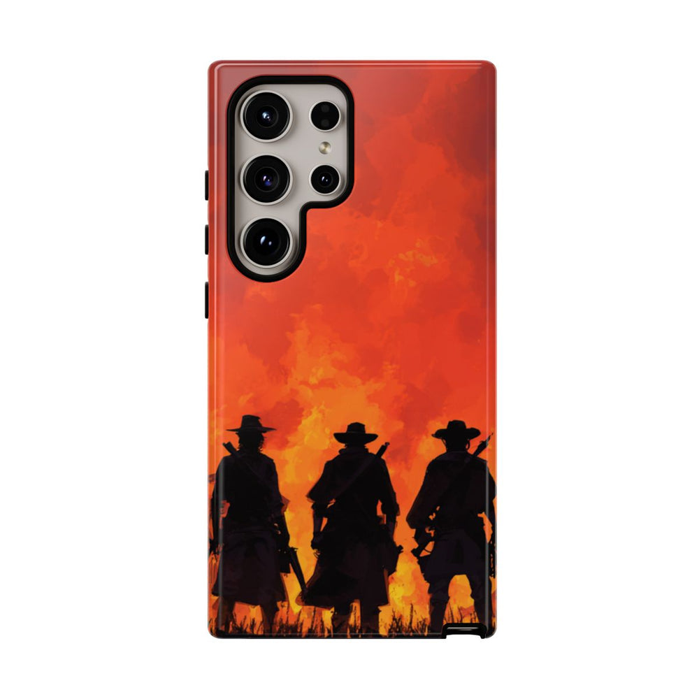 Silhouetten van Drie Cowboys bij Vurige Zonsondergang