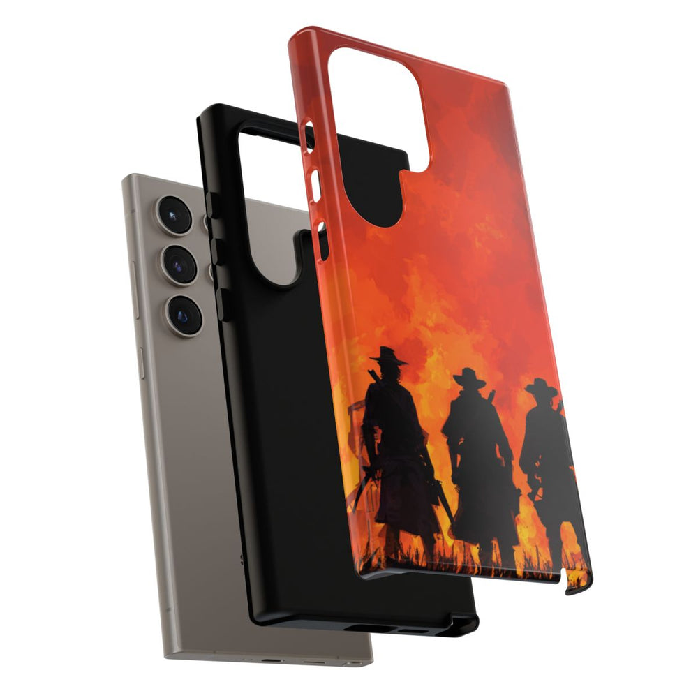 Silhouetten van Drie Cowboys bij Vurige Zonsondergang