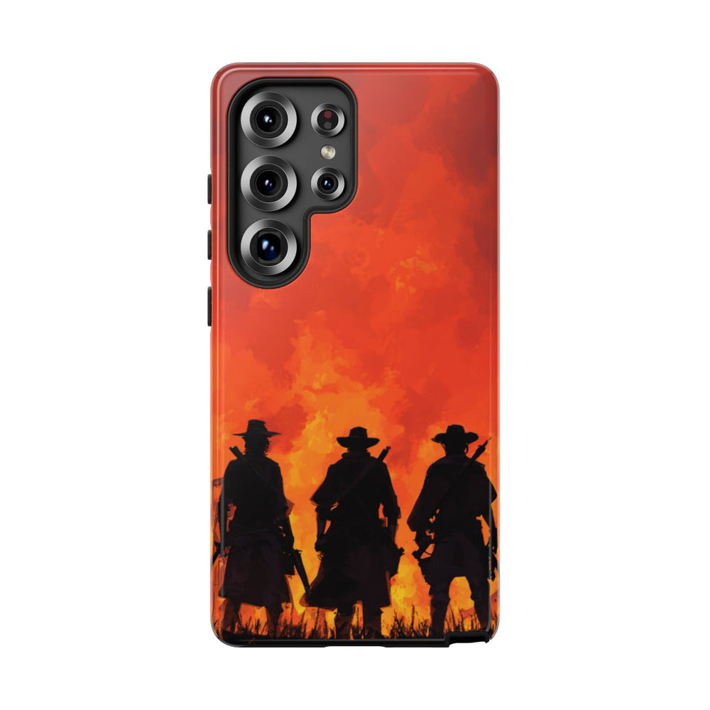 Silhouetten van Drie Cowboys Tegen Vurige Zonsondergang