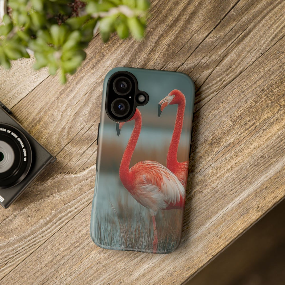 Drie Flamingo’s bij Water en Riet