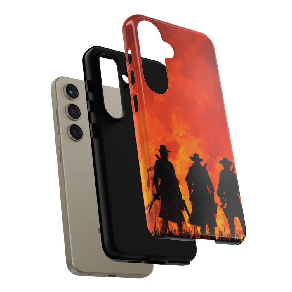 Silhouetten van Drie Cowboys bij Vurige Zonsondergang