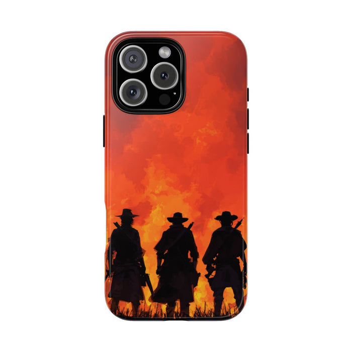 Silhouetten van Drie Cowboys Tegen Vurige Zonsondergang