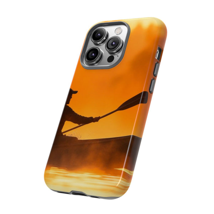 Silhouet van Kanoër bij Zonsondergang