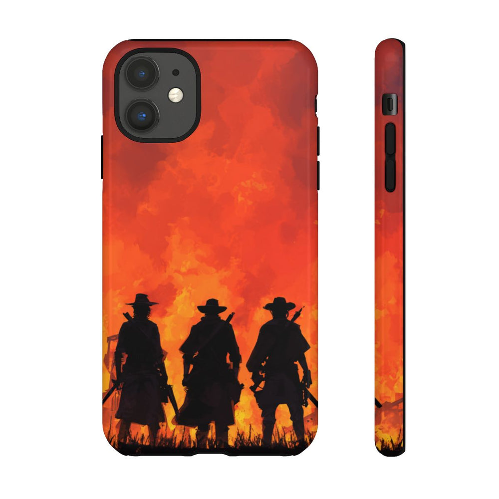 Silhouetten van Drie Cowboys bij Vurige Zonsondergang