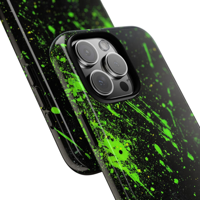 Neon Groene Spetters op Zwarte Achtergrond