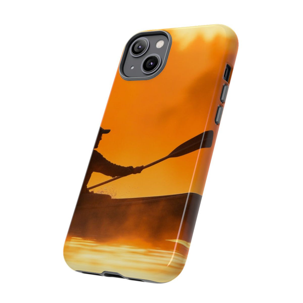 Silhouet van Kanoër bij Zonsondergang