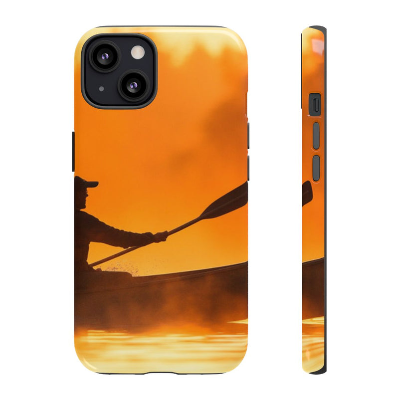 Silhouet van Kanoër bij Zonsondergang