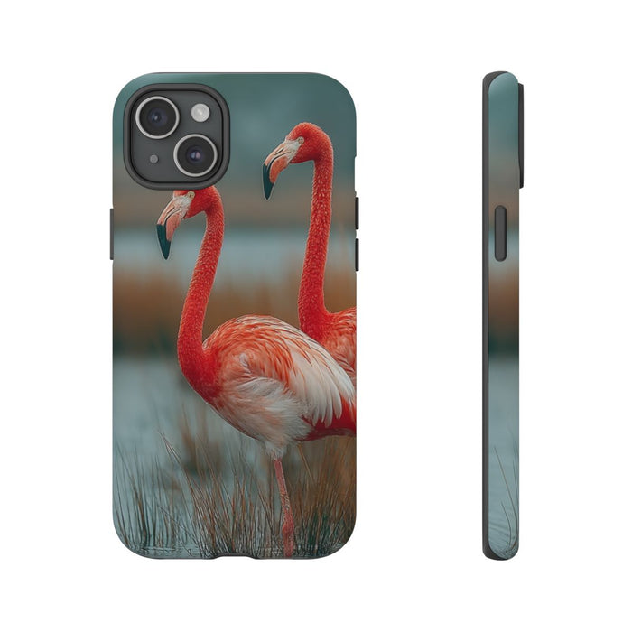 Drie Flamingo's bij Water en Riet