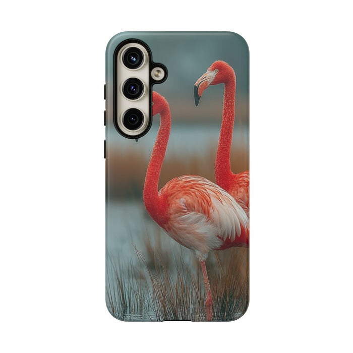 Drie Flamingo’s in Moerasgebied