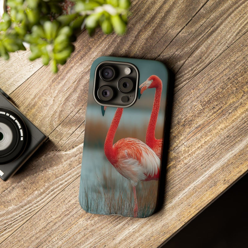Drie Flamingo’s bij Water en Riet