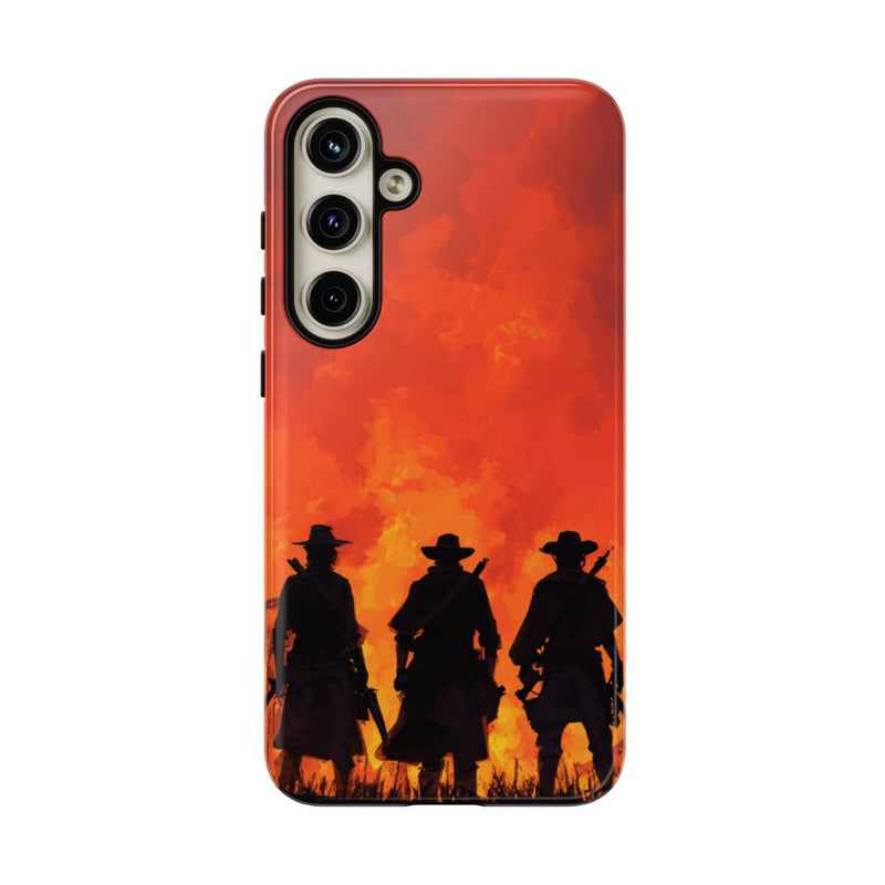 Silhouetten van Drie Cowboys Tegen Vurige Zonsondergang