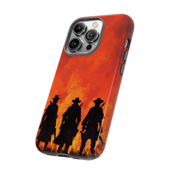 Silhouetten van Drie Cowboys bij Vurige Zonsondergang