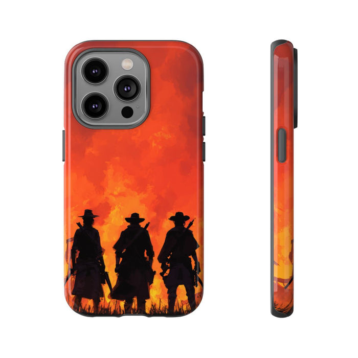 Silhouetten van Drie Cowboys bij Vurige Zonsondergang