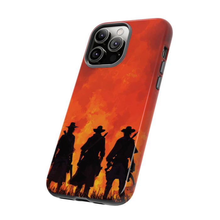 Silhouetten van Drie Cowboys bij Vurige Zonsondergang