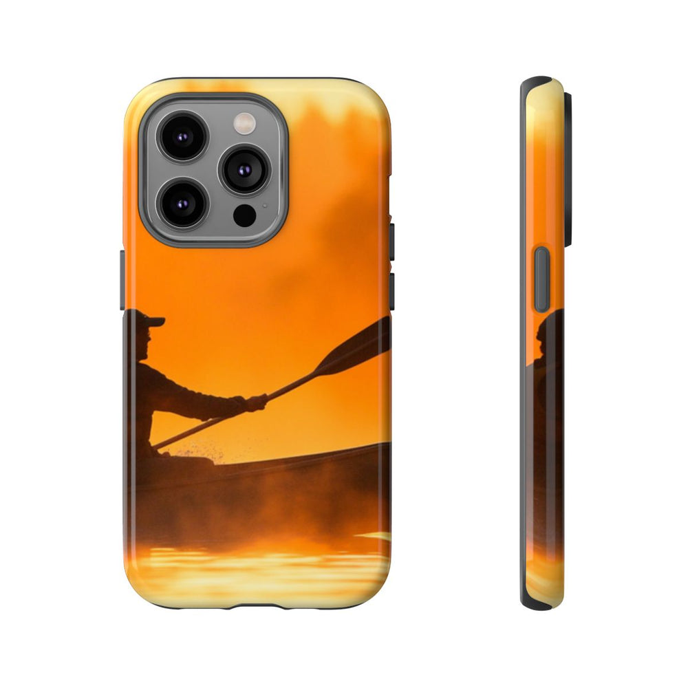 Silhouet van Kanoër bij Zonsondergang