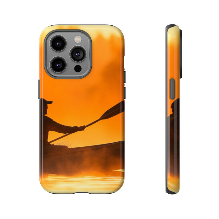 Silhouet van Kanoër bij Zonsondergang