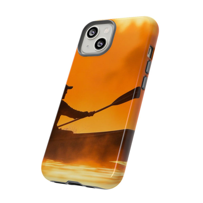 Silhouet van Kanoër bij Zonsondergang