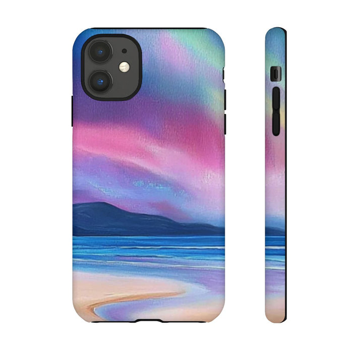 Noorderlicht Boven Rotsachtige Kust en Strand