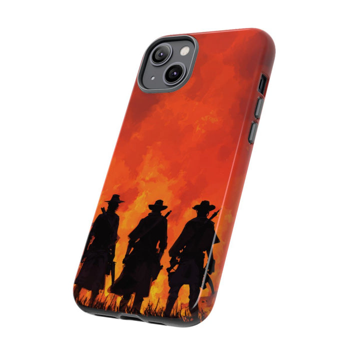 Silhouetten van Drie Cowboys bij Vurige Zonsondergang