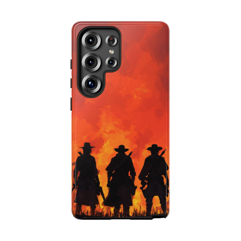 Silhouetten van Drie Cowboys Tegen Vurige Zonsondergang