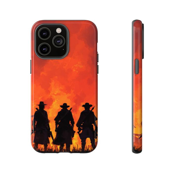 Silhouetten van Drie Cowboys bij Vurige Zonsondergang