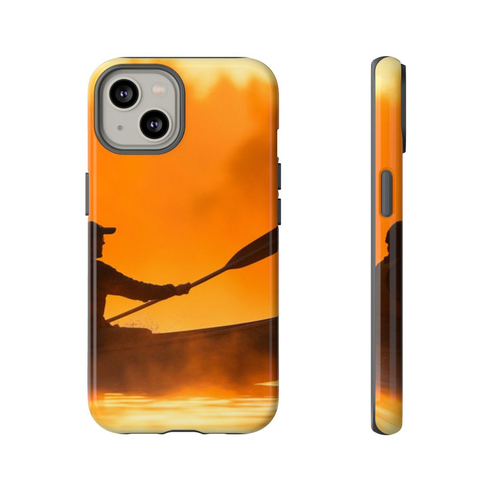 Silhouet van Kanoër bij Zonsondergang