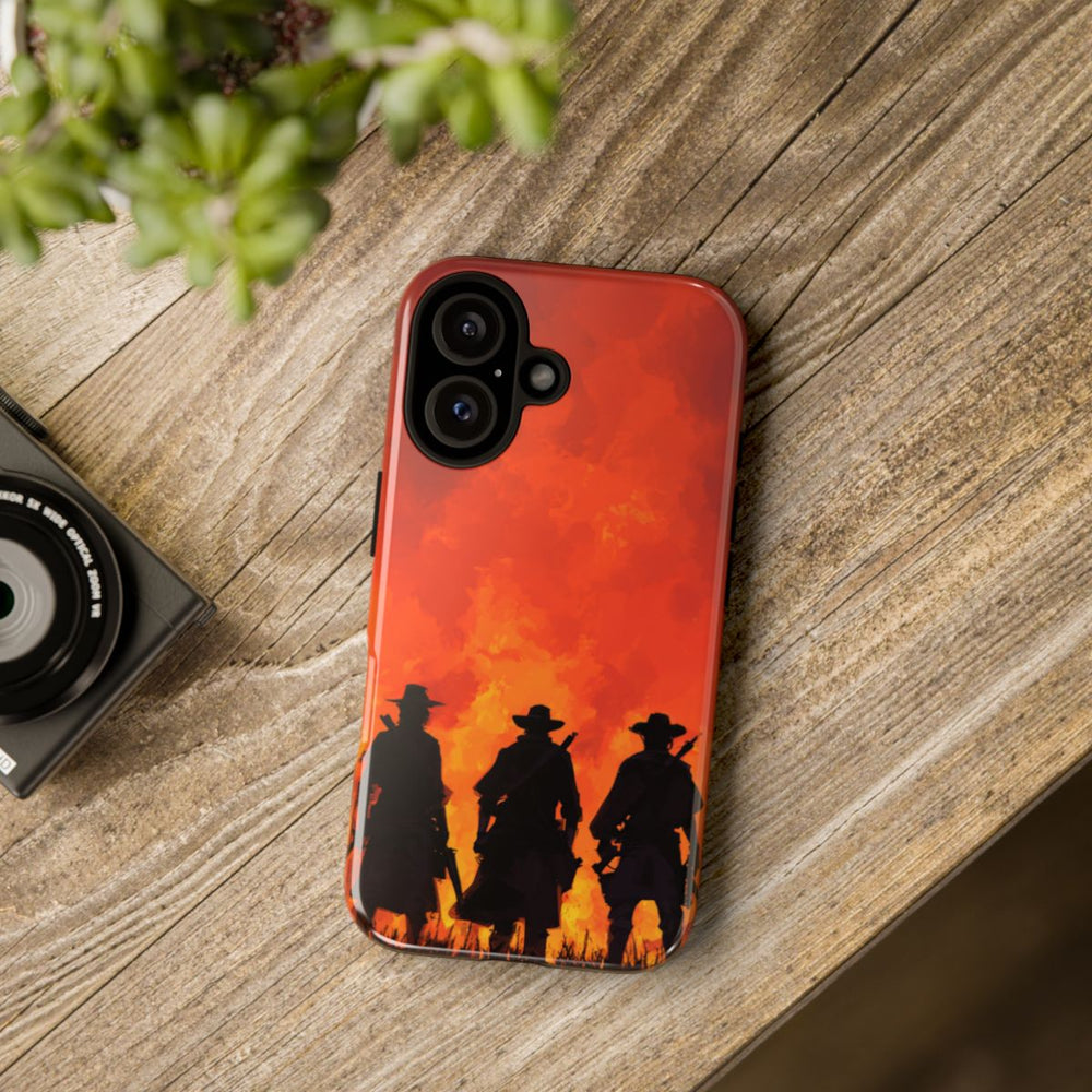 Silhouetten van Drie Cowboys Tegen Vurige Zonsondergang