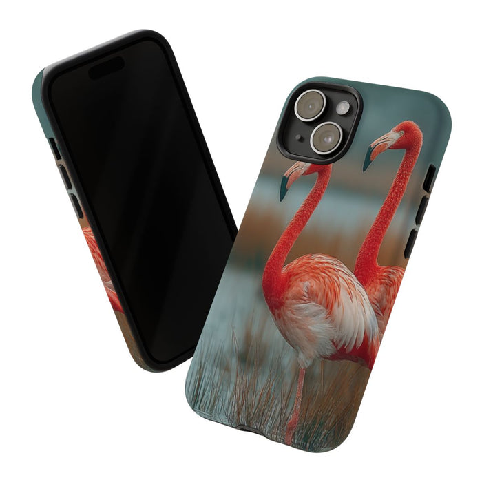 Drie Flamingo’s bij Water en Riet