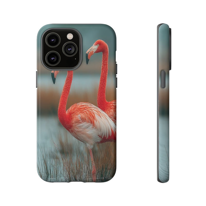 Drie Flamingo's bij Water en Riet