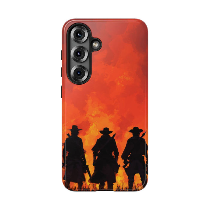 Silhouetten van Drie Cowboys Tegen Vurige Zonsondergang