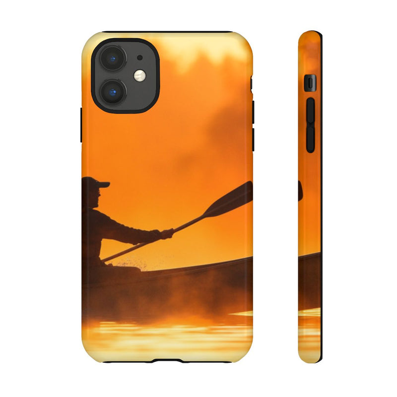 Silhouet van Kanoër bij Zonsondergang