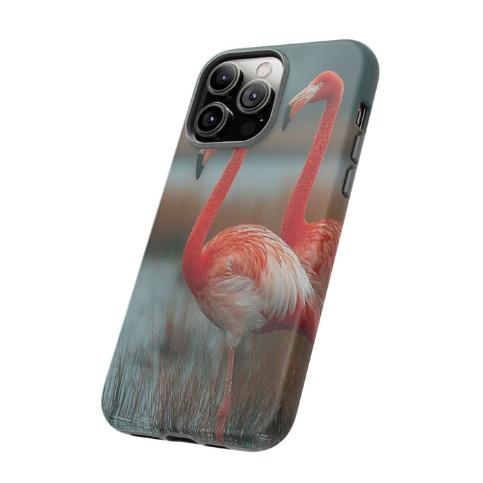 Drie Flamingo's bij Water en Riet