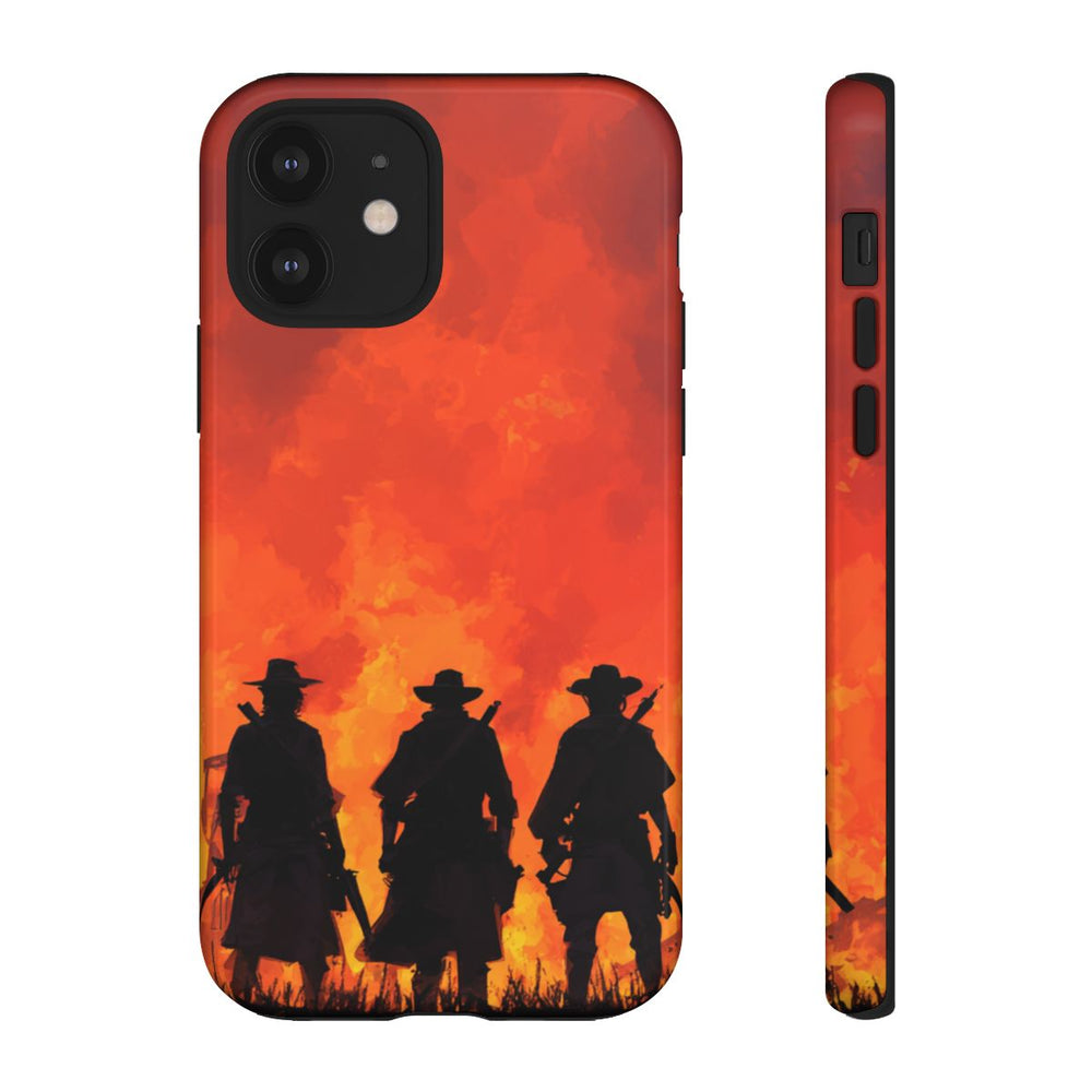 Silhouetten van Drie Cowboys bij Vurige Zonsondergang