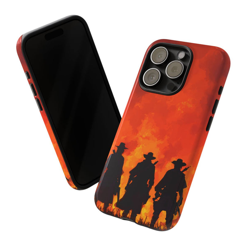 Silhouetten van Drie Cowboys bij Vurige Zonsondergang
