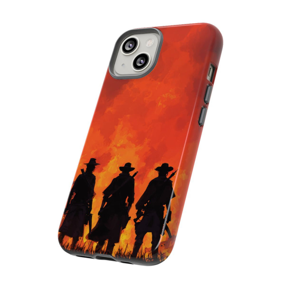 Silhouetten van Drie Cowboys Tegen Vurige Zonsondergang