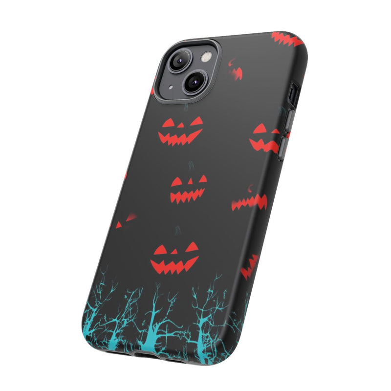 Gloeiende Pompoengezichten Boven Blauwe Bomen