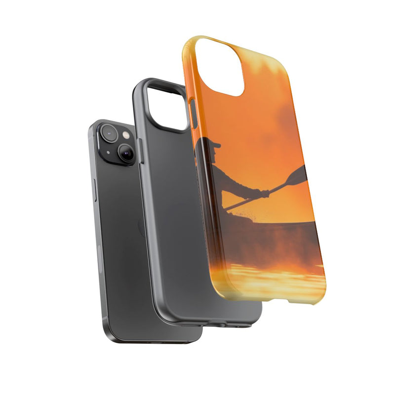 Silhouet van Kanoër bij Zonsondergang