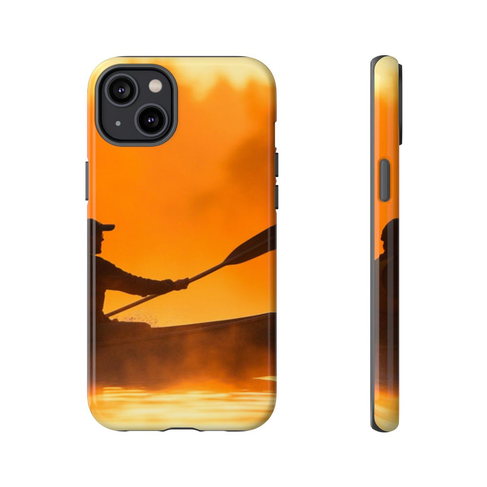 Silhouet van Kanoër bij Zonsondergang