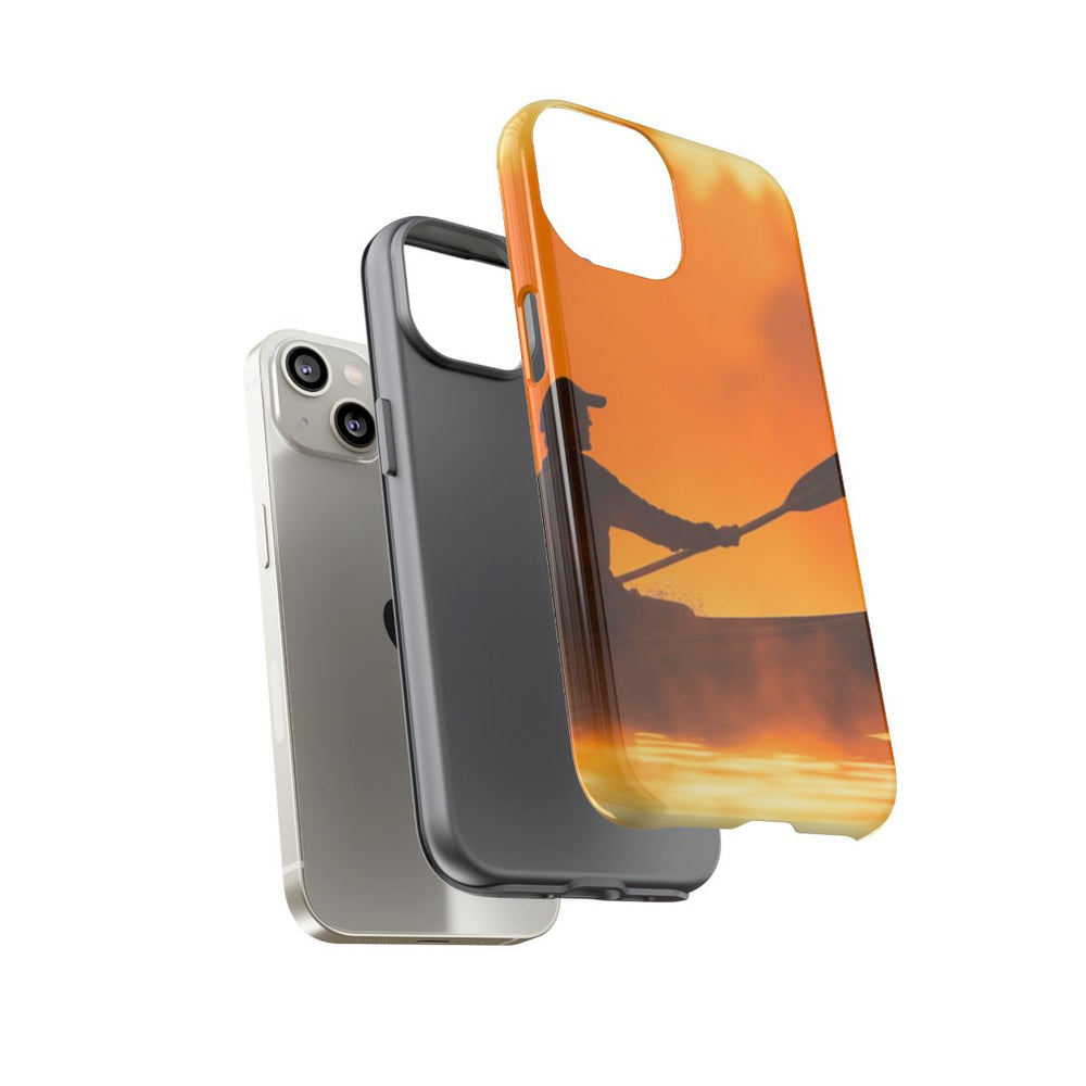 Silhouet van Kanoër bij Zonsondergang