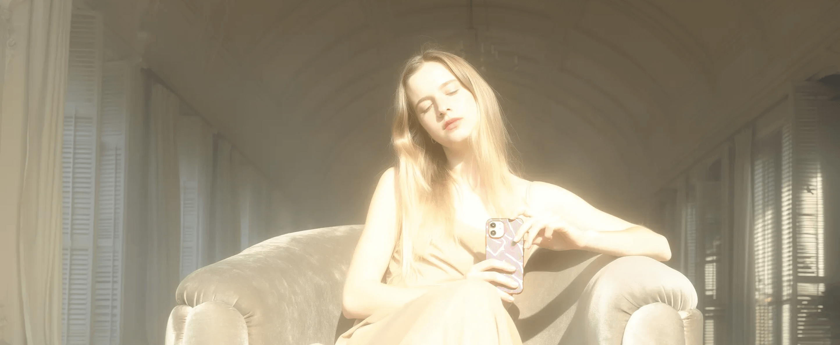 Marquee image with woman holding a phone with case